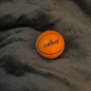 Curaleaf OrangeBasket Ball Chapstick never opened never used ..brand new swag
